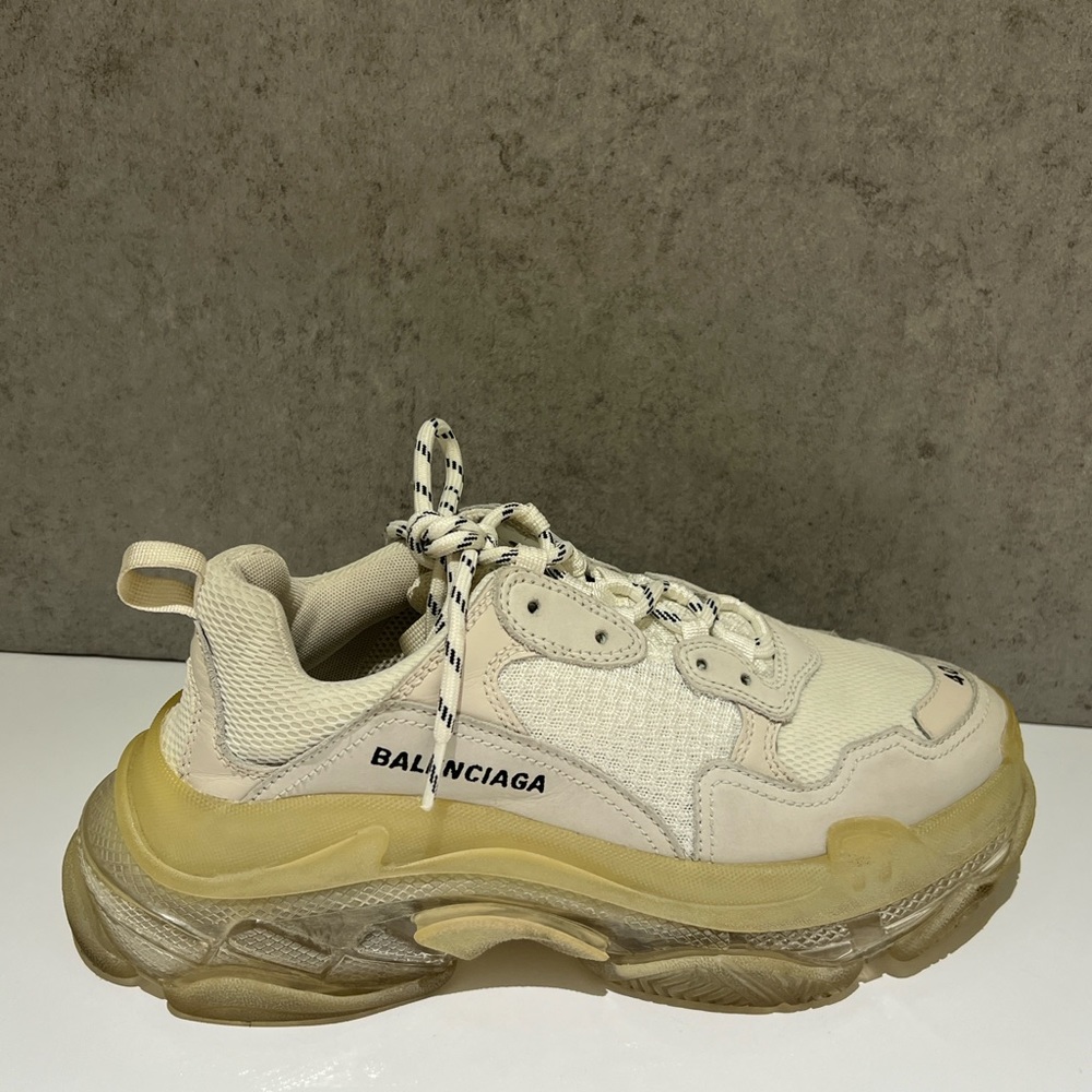 Balenciaga Women’s Triple S Clear Sole Sneaker in light beige.